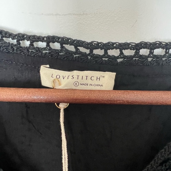 Black Peplum Top with Lace Trim - Picture 3 of 4